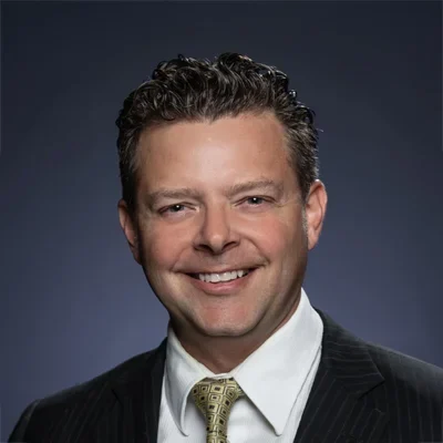 A headshot photo of Cam, a team member at Rebelution Healthcare