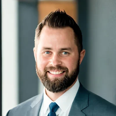 A headshot photo of Dr. Josh Rood, a chiropractor at Rebelution Healthcare