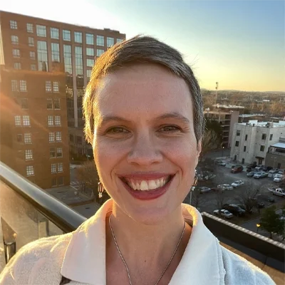 A headshot photo of Rachel, a team member at Rebelution Healthcare