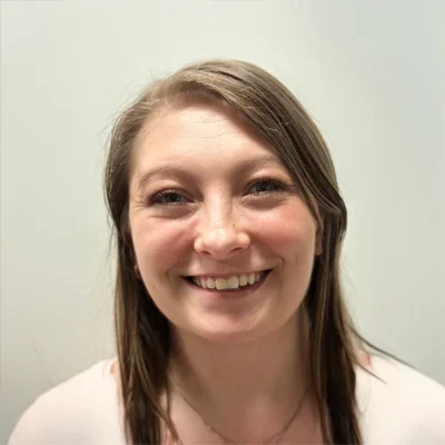 A headshot photo of Whitney, a team member at Rebelution Healthcare